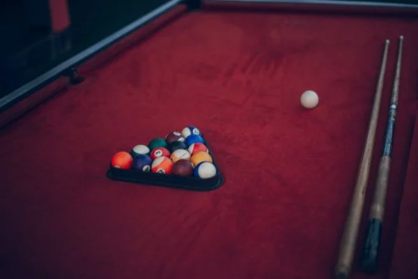 snooker table with red balls